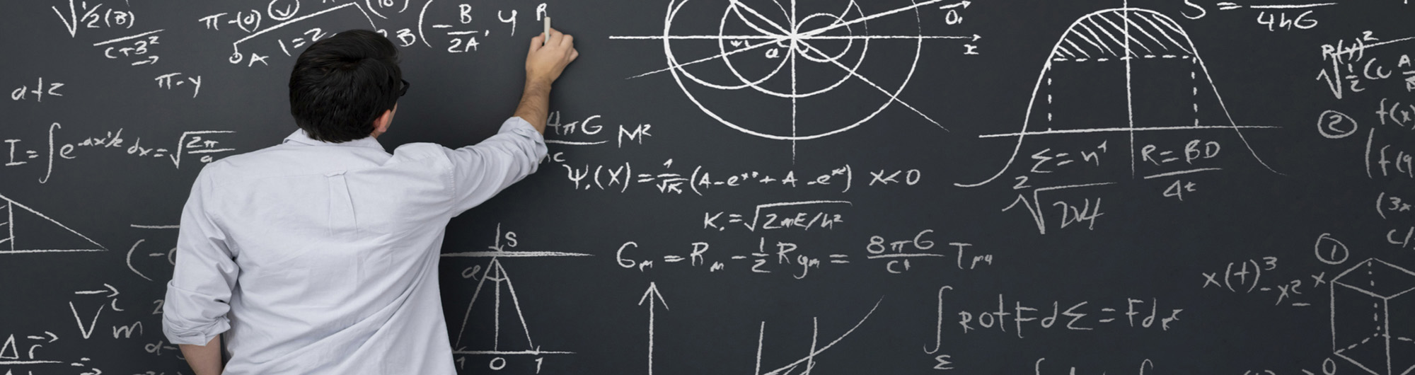 physics student at a chalkboard